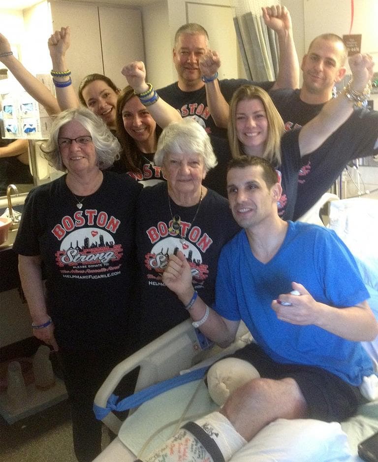 Marc Fucarile and his family celebrates his move to rehab. (Martha Bebinger/WBUR)