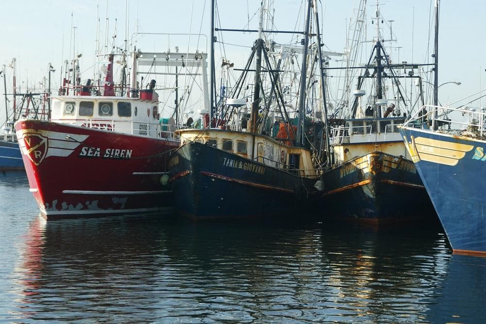 This April 30, 2004 file photograph shows fishing boats docked at the pier in New Bedford, Mass. The U.S. seafood catch reached a 17-year high in 2011, with all fishing regions of the country showing increases in both the volume and value of their harvests. New Bedford, Mass., had the highest-valued catch for the 12th straight year, due largely to its scallop fishery. (Stew Milne/AP)
