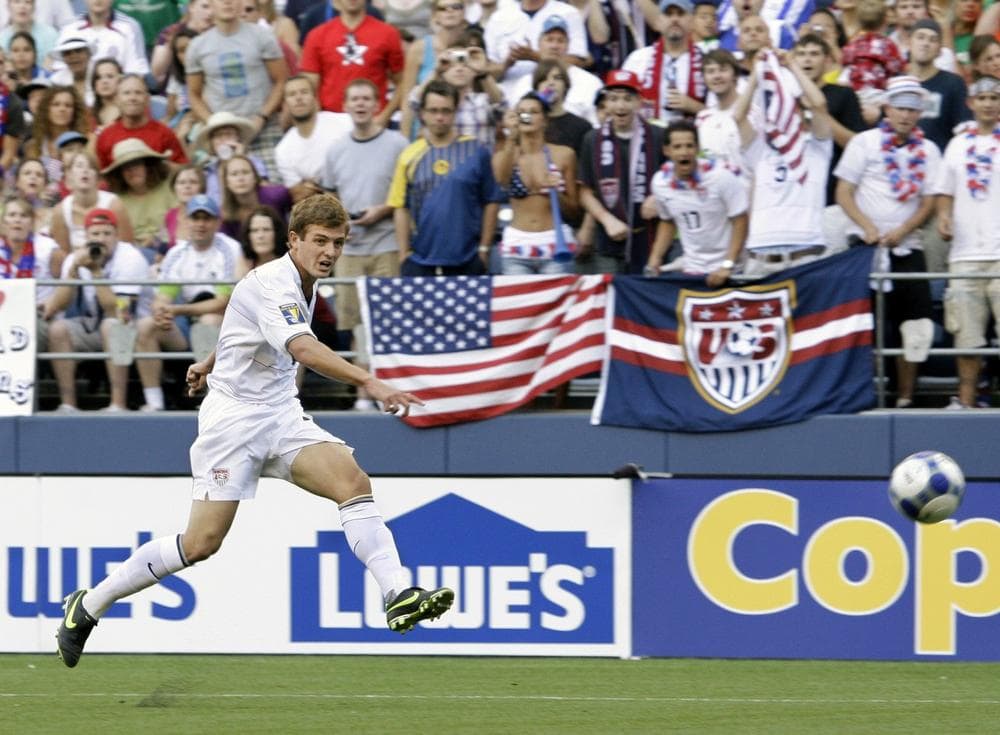 In July 4, 2009 file photo, United States' Robbie Rogers kicks against Grenada in a CONCACAF Gold Cup match at Qwest Field in Seattle. Rogers is eligible to make his debut with the Los Angeles Galaxy after Major League Soccer said it had received his international transfer certificate. The former U.S. national team winger will become the first openly gay male athlete to compete in a North American professional team sport when he makes his debut for the Galaxy, which could come in Sunday night's, May 26, 2013, game against Seattle. (AP)