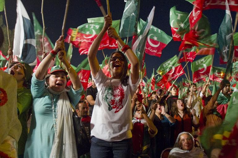 Supporters of Pakistan Tehreek-e-Insaf or Moment for Justice party attend an election campaign rally in Islamabad, Pakistan, Thursday, May 9, 2013 (AP)