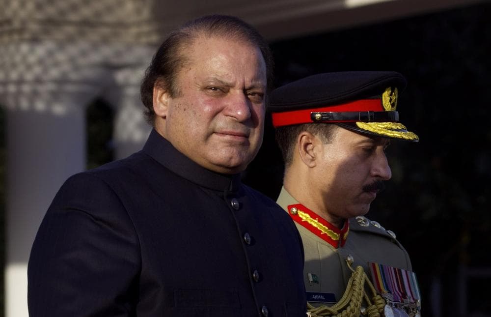 Newly elected Prime Minister of Pakistan Nawaz Sharif, left, arrives at the Prime Minister's house in Islamabad, Pakistan, Wednesday, June 5, 2013. (B.K. Banagsh/AP)