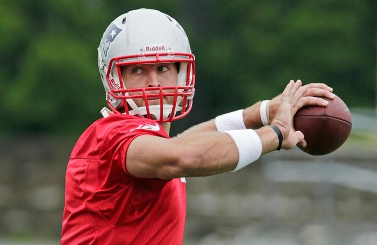 New England Patriots QB Tim Tebow throws during minicamp in Foxborough Tuesday. (Charles Krupa/AP)
