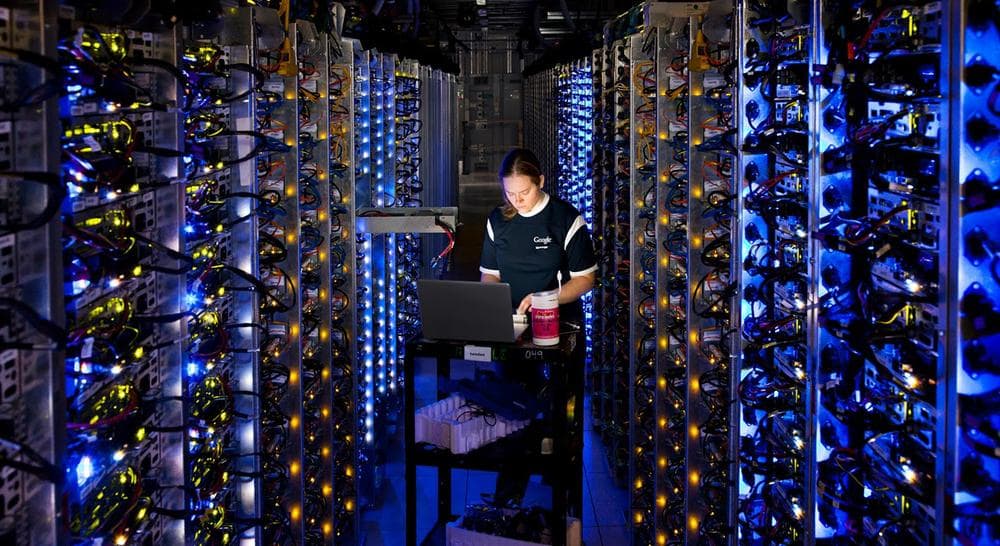 In this undated photo, an employee of Google diagnoses an overheated computer processor at the company's data center in The Dalles, Ore. Google uses these data centers to store email, photos, video, calendar entries and other information shared by its users. These centers also process the hundreds of millions of searches that Internet users make on Google each day. (Connie Zhou/AP/Google)