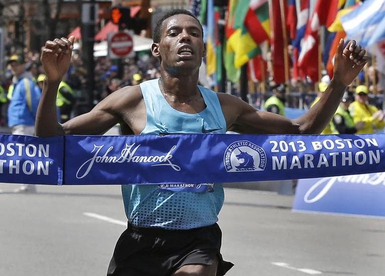 Lelisa Desisa, of Ethiopia, crossed the 2013 Boston Marathon finish line to win the men's division a few hours before two bombs exploded near the finish line, killing three and injuring more than 260. (Elise Amendola/AP)