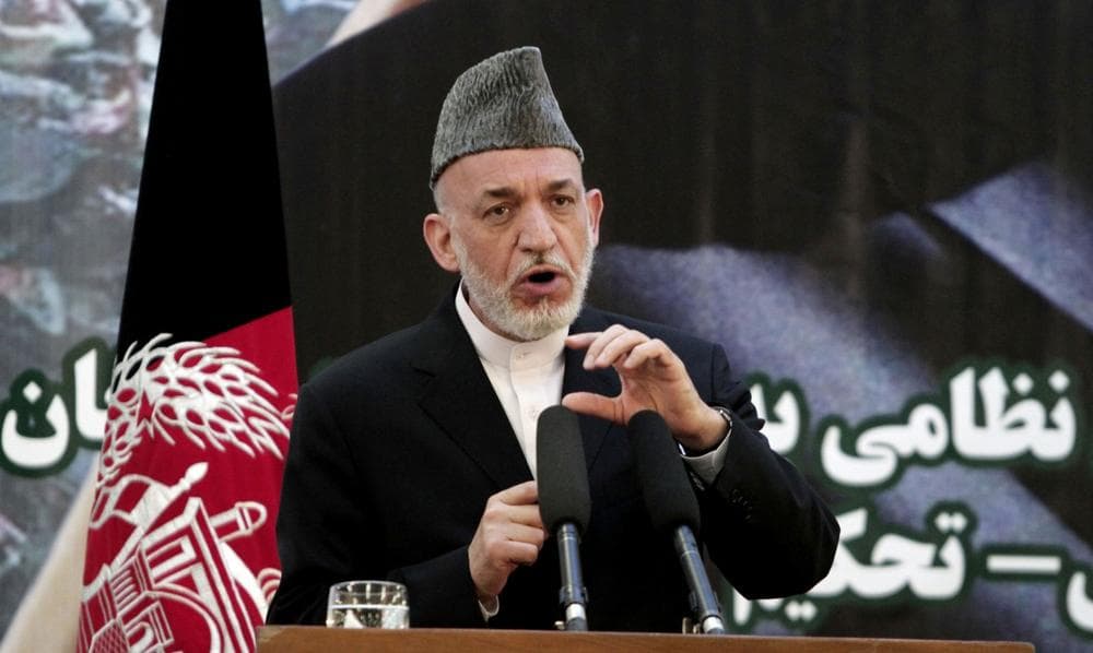 Afghan President Hamid Karzai speaks at a press conference during a ceremony at a military academy on the outskirts of Kabul, Afghanistan, Tuesday, June 18, 2013. (Rahmat Gul/AP)