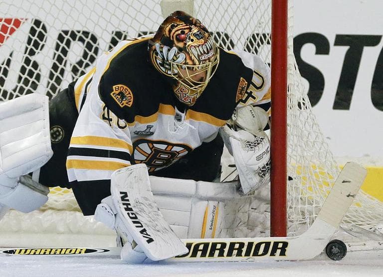 Bruins goalie Tuukka Rask seals off the goal against the Blackhawks in the second period of Game 2 of the Stanley Cup finals. (Nam Y. Huh/AP)