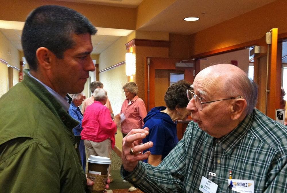 Garbiel Gomez campaigned at a retirement community in Peabody on Friday. (Fred Thys/WBUR)