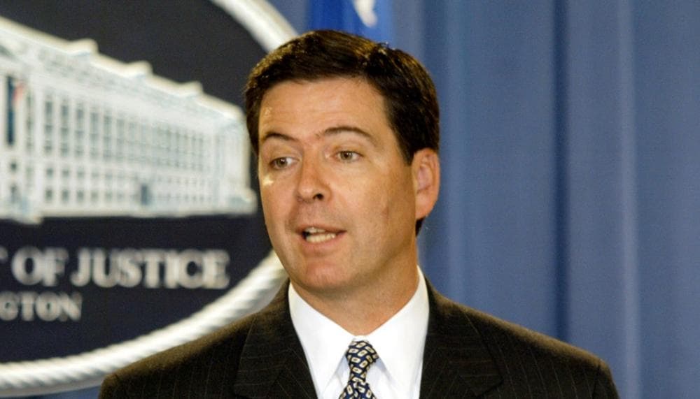 Deputy Attorney General James Comey, in Washington, Wednesday, Sept. 22, 2004, briefs reporters at the Justice Department. (J. Scott Applewhite/AP)