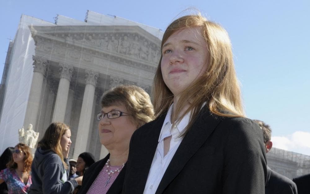 Abigail Fisher, right, who brought the affirmative action case against the University of Texas, is pictured outside the Supreme Court in Washington, Oct. 10, 2012.  (Susan Walsh/AP)