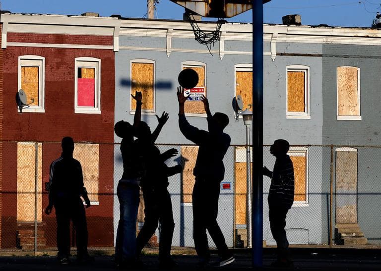 Children play basketball at a park in Baltimore. (AP Photo/Patrick Semansky)