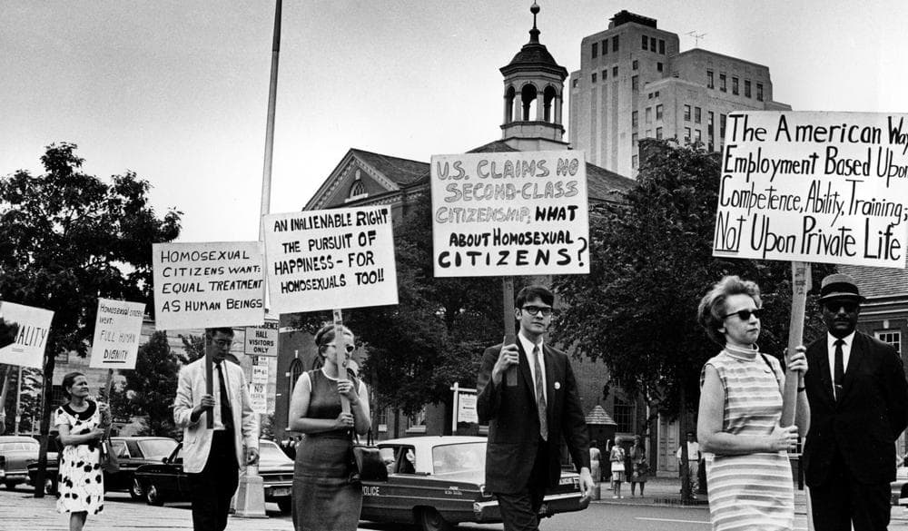 In this July 4, 1967 photo, Kay Tobin Lahusen, right, and other demonstrators carry signs calling for protection of homosexuals from discrimination as they march in a picket line in front of Independence Hall in Philadelphia. (AP)