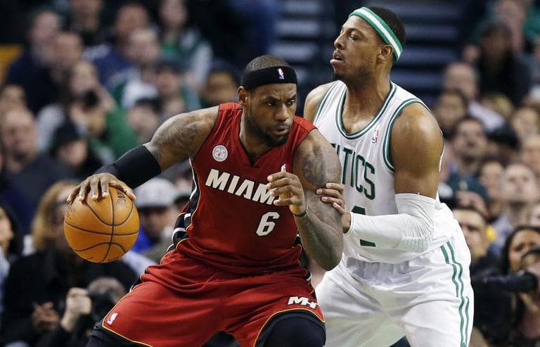 Miami Heat's LeBron James (6) looks to move past Boston Celtics' Paul Pierce (34) in the first quarter of an NBA basketball game in Boston, Monday, March 18, 2013. (Michael Dwyer/AP)