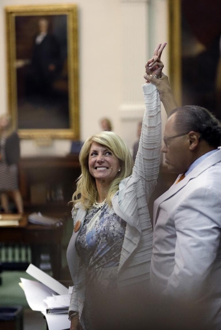 Sen. Wendy Davis, D-Fort Worth, left, who tries to filibuster an abortion bill, reacts as time expires, Tuesday, June 25, 2013, in Austin, Texas. (Eric Gay/AP)