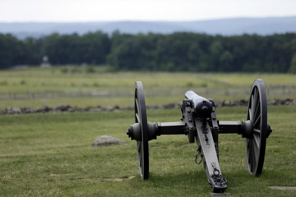 A Union artillery piece sits atop a ridge above the field of Pickett's Charge, Wednesday, June 5, 2013, in Gettysburg, Pa. (Matt Rourke/AP)