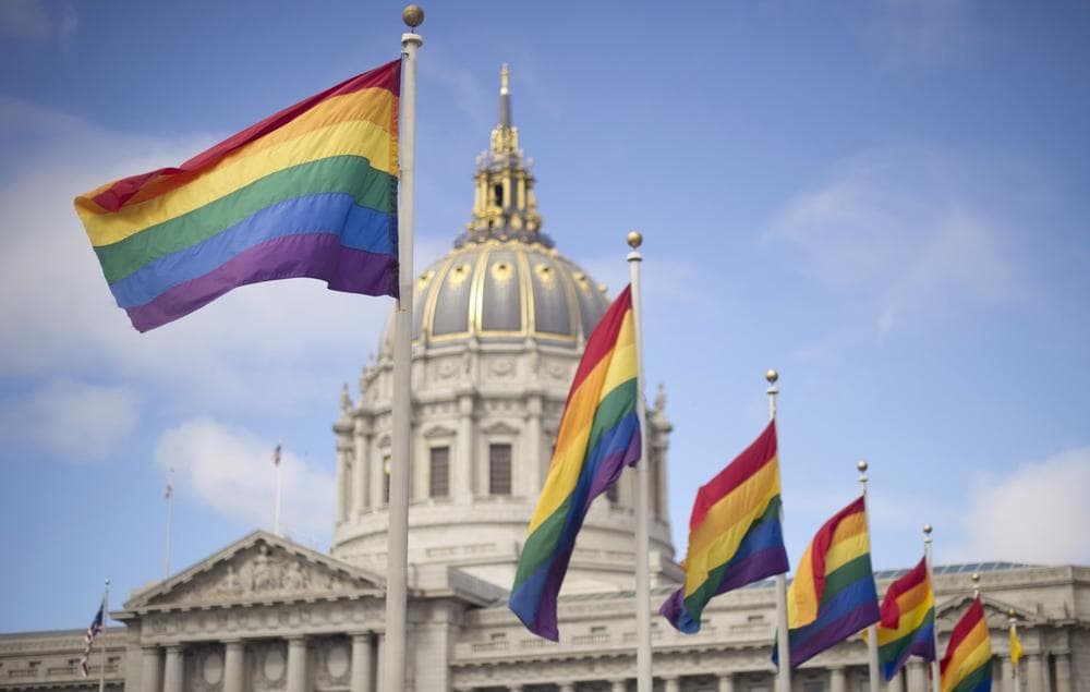 Rainbow flags fly in front of San Francisco City Hall on Wednesday, June 26, 2013, shortly after the U.S. Supreme Court decision that cleared the way for same-sex marriage in California. (Noah Berger/AP)