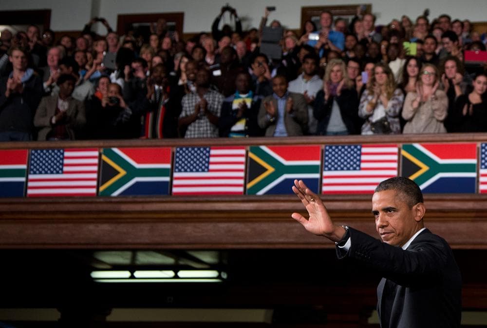 In this file photo, then-U.S. President Barack Obama speaks at the University of Cape Town Sunday, June 30, 2013, in Cape Town, South Africa. The visit comes as beloved former South African president and anti-apartheid hero Nelson Mandela lies very ill in a Johannesburg hospital. In deeply personal remarks Obama summoned young Africans to fulfill Mandela's legacy, challenging them to shore up progress on the continent that rests on a &quot;fragile foundation.&quot; &quot;Nelson Mandela showed us that one man's courage can move the world,&quot; he said. (Evan Vucci/AP)