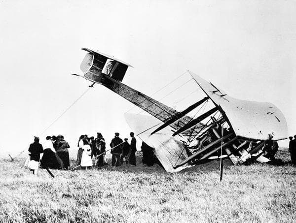 Aviation pioneers John Alcock and Arthur Whitten Brown crash-land their Vickers Vimy aircraft in a bog near the wireless station at Clifden, Ireland, on June 15, 1919, after they complete the first nonstop transatlantic flight from St. Johns, Newfoundland, to the Irish coast. (AP Photo)