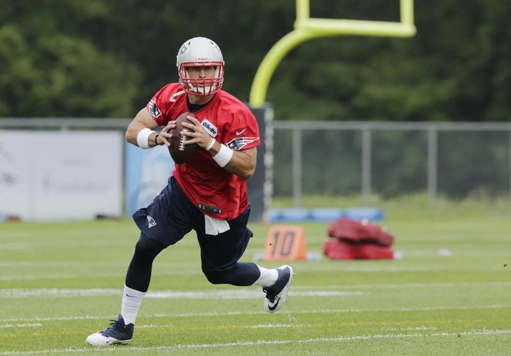 This is not Photoshopped. Tim Tebow is now a member of the New England Patriots. (AP)