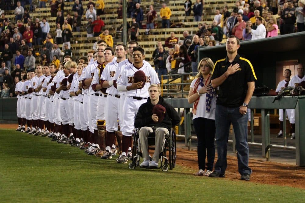 Cory Hahn (seated) at a game with his Arizona State teammates. Hahn was paralyzed in his third game for ASU in 2011. (Courtesy of Arizona State University)