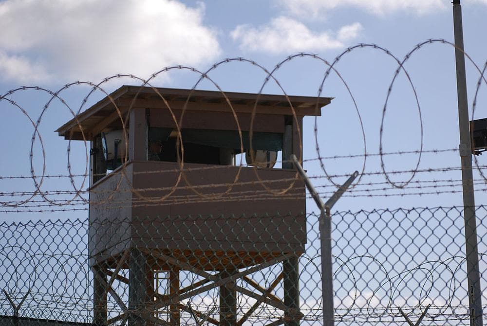 GUANTANAMO BAY, Cuba (Dec. 31, 2009) A Soldier stands guard in a tower at Camp Delta at Joint Task Force Guantanamo Bay. (U.S. Army photo by Spc. Cody Black/Wikimedia Commons)