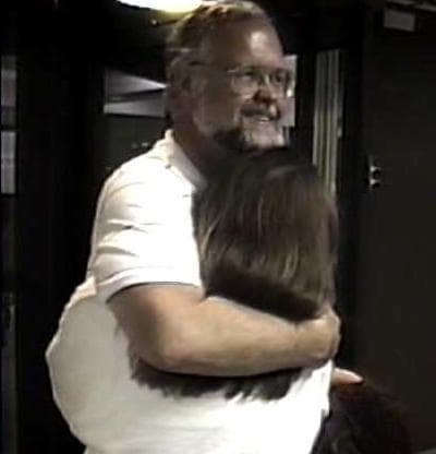 The author hugs her dad, 1993. (Courtesy)