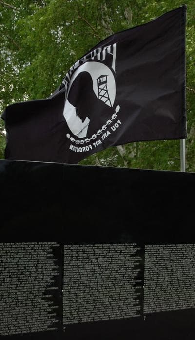 The &quot;POW-MIA&quot; flag flies over the &quot;Moving Wall.&quot; (Greg Cook)