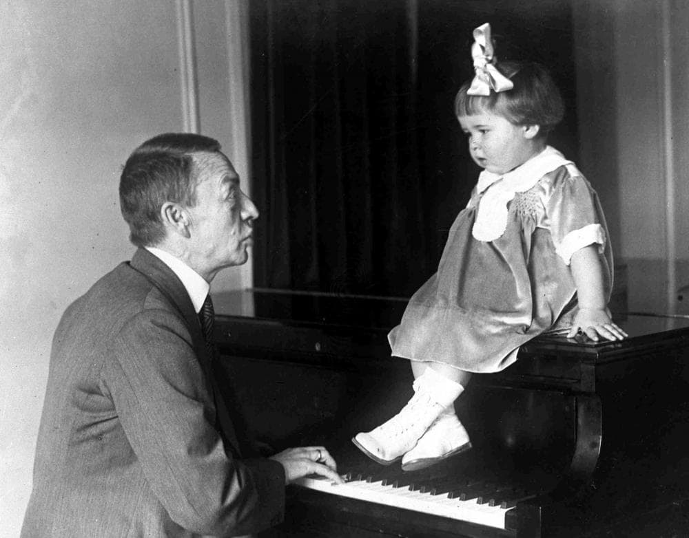 World famous Russian composer and pianist Sergei Rachmaninoff plays for his granddaughter Sophie , in New York, USA, Nov. 15, 1927. (AP Photo)