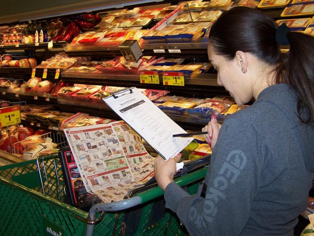  A &quot;Cooking Matters at the Store&quot; participant learns how to maximize their SNAP dollars. (Courtesy Alicia McCabe)