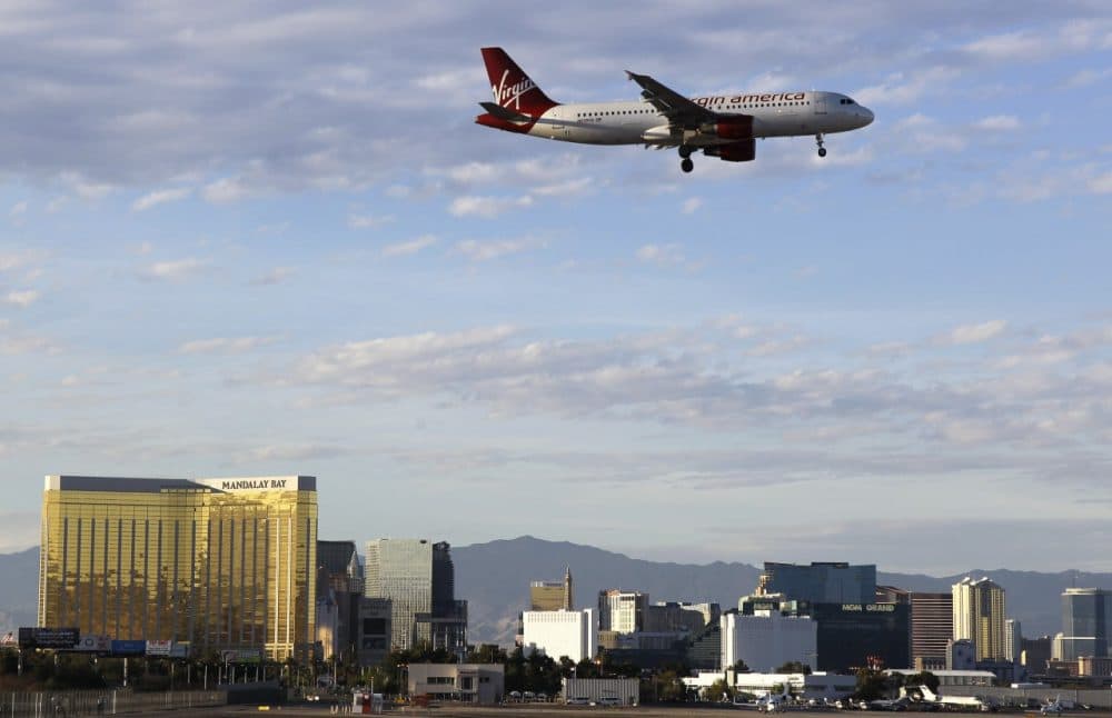 A Virgin America flight prepares to land at McCarran International Airport, March 2012, in Las Vegas. (Julie Jacobson/AP)