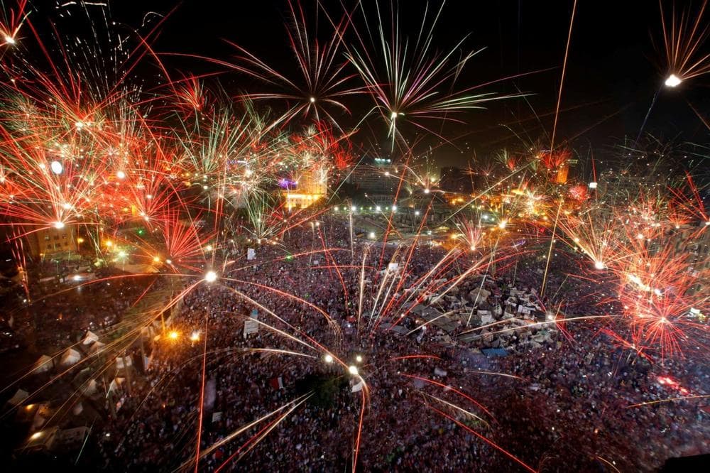 Fireworks light the sky opponents of Egypt&#039;s Islamist President Mohammed Morsi celebrate in Tahrir Square in Cairo, Egypt, Wednesday, July 3, 2013. (Amr Nabil/AP)