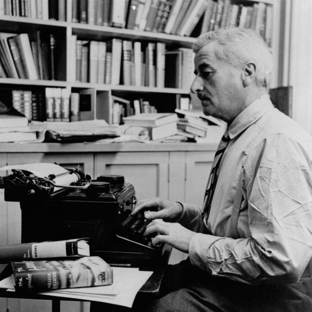William Faulkner works at his typewriter Aug. 12, 1954, in Oxford, Miss. (AP)