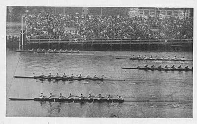 This photo from the 1936 Olympic Games shows the University of Washington eight-oar boat (top) crossing the finish line just ahead of second-place Italy and third-place Germany. (University of Washington Libraries, Special Collection)
