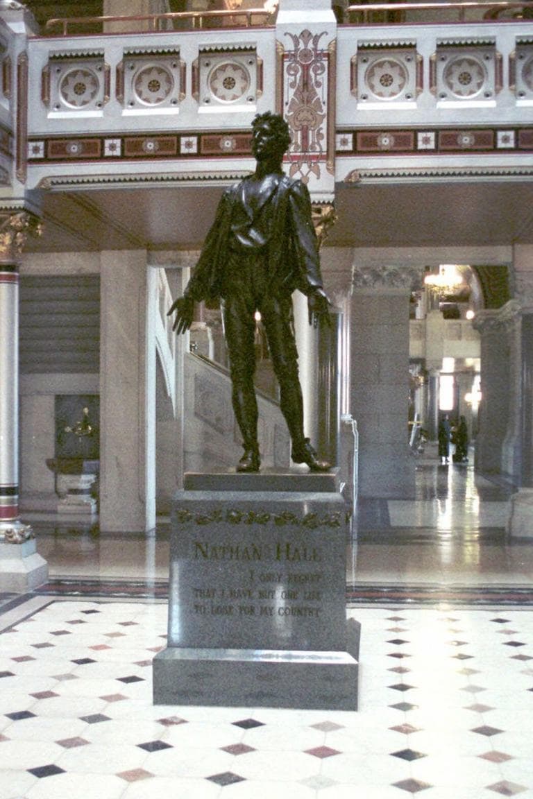 A statue of Revolutionary War hero and Connecticut native Nathan Hale is seen here at the state Capitol in Hartford. Hale was executed by the British when he was caught spying. (Bob Child/AP)