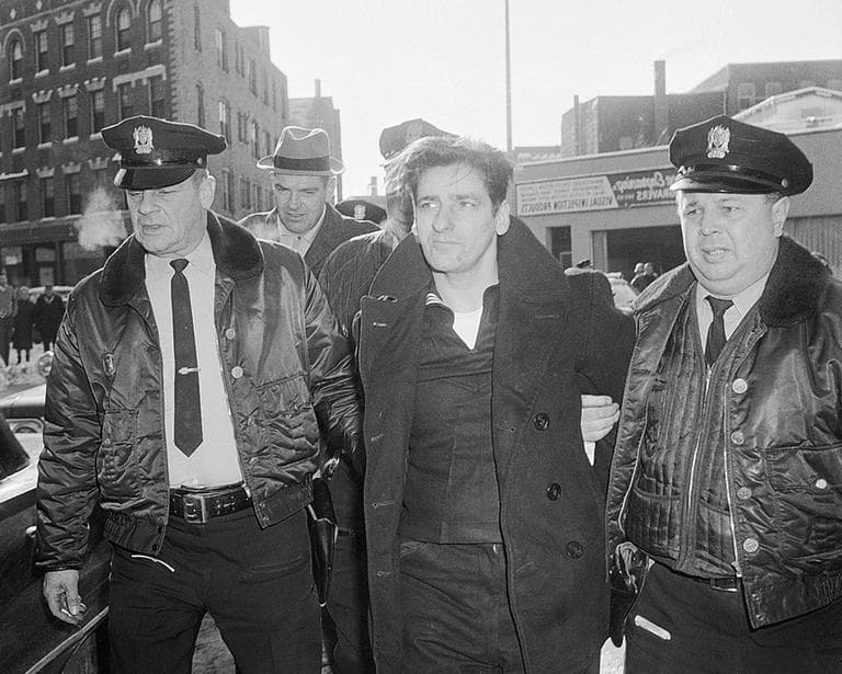 Albert DeSalvo, 35, is surrounded by police after his capture in Lynn on Feb. 25, 1967. DeSalvo was nabbed in a store a day after he escaped from Bridgewater State Hospital for the criminally insane. (AP)