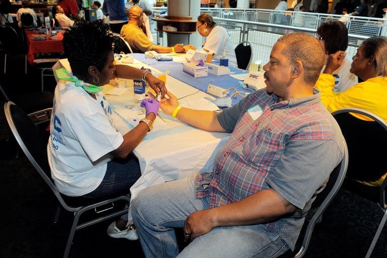 Detroit Medical Center nurse Etrulia Lake checks the cholesterol level of Ken Bartell during a health screening for African American men, Saturday June 20, 2009. According to the CDC, about 1 in every 3 adults in the U.S. has high LDL (the &quot;bad&quot;) cholesterol. (Steve Perez, The Detroit Free Press/AP)