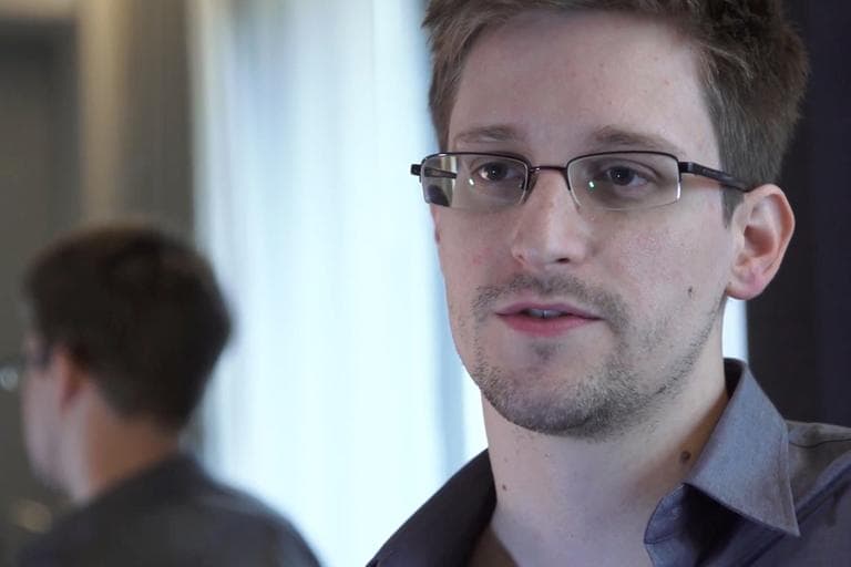 This photo provided by The Guardian Newspaper in London shows Edward Snowden, who worked as a contract employee at the National Security Agency, on Sunday, June 9, 2013, in Hong Kong. NSA leaker Edward Snowden claims the spy agency gathers all communications into and out of the U.S. for analysis, despite government claims that it only targets foreign traffic. (Glenn Greenwald and Laura Poitras, The Guardian/AP)