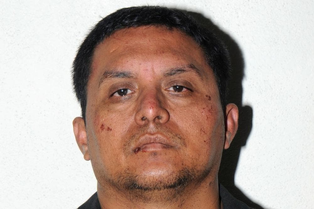 In this photo released on Tuesday, July 16, 2013 by the Mexican Navy, is Zetas drug cartel leader Miguel Angel Trevino Morales after his arrest in Mexico. (Mexican Navy via AP)