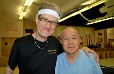 Carlo Wolff and Fumio Yoshikawa during a break in the table tennis action. (WCPN)