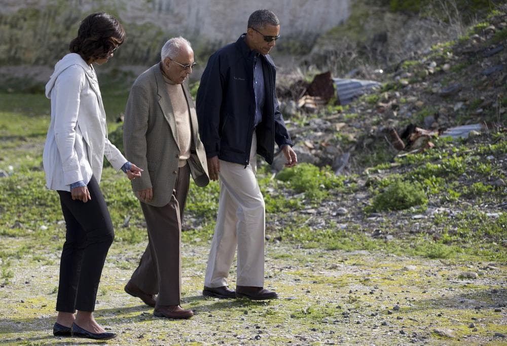 U.S. President Barack Obama, right, and first lady Michelle Obama, left, tour Robben Island with Ahmed Kathrada, who was imprisoned with Nelson Mandela, Sunday, June 30, 2013, in South Africa. (Evan Vucci/AP)