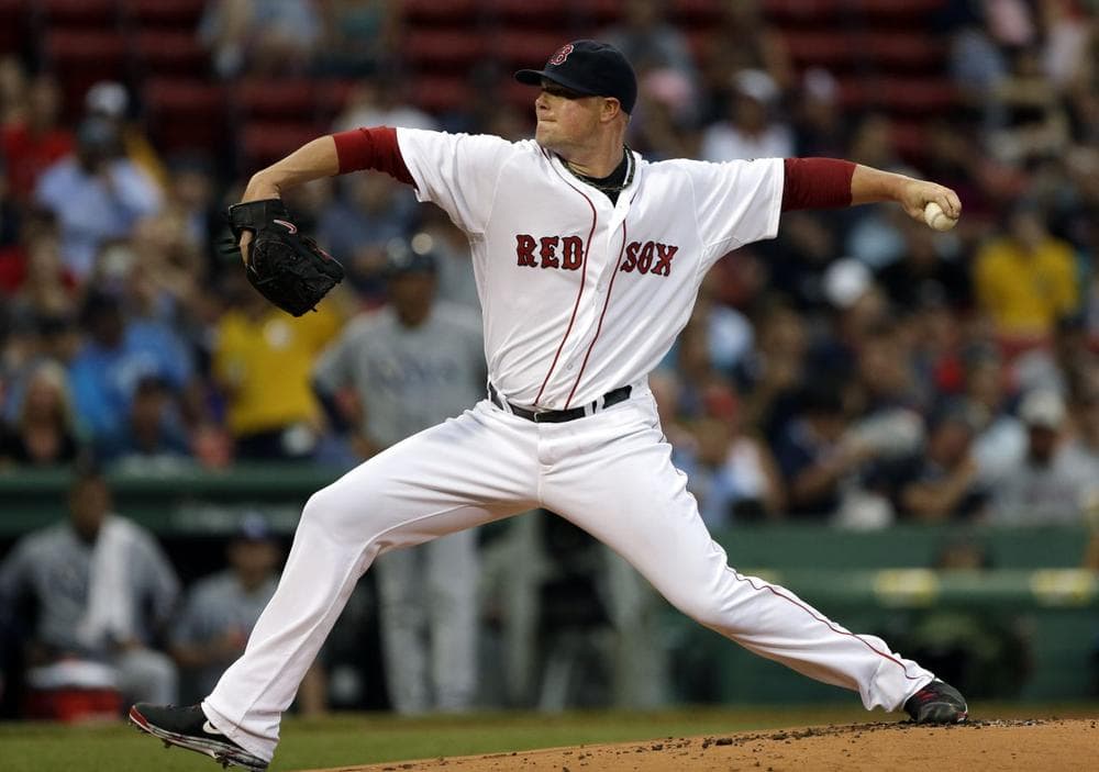 Boston Red Sox starting pitcher Jon Lester delivers to the Tampa Bay Rays. (AP /Elise Amendola)