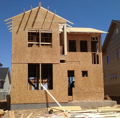 A home under construction by New Town Builders in Denver's Stapleton neighborhood. The company is building 78 homes, and all but one have already sold. (Ben Markus/Colorado Public Radio)