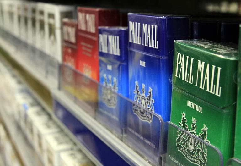 Boxes of cigarettes sit on shelves in a Brunswick, Maine, store. (Pat Wellenbach/AP)