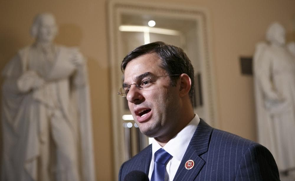 Rep. Justin Amash, R-Mich., comments about the vote on the defense spending bill and his failed amendment that would have cut funding to the National Security Agency's program that collects the phone records of U.S. citizens and residents, at the Capitol, Wednesday, July 24, 2013. (J. Scott Applewhite/AP)