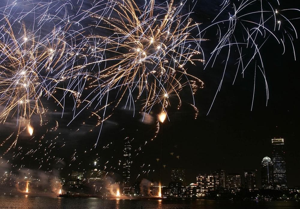 Fireworks explode over the Charles River and the Boston skyline Monday, July 4, 2005. (AP Photo/Winslow Townson)