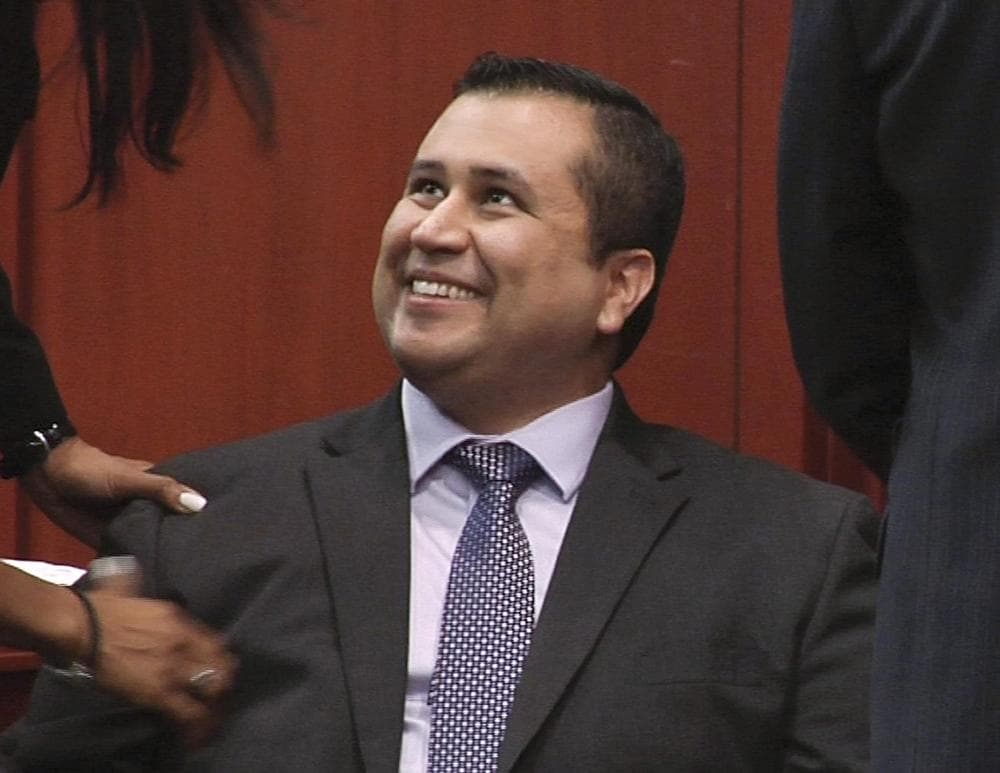 George Zimmerman smiles after a not guilty verdict was handed down in his trial. (AP)