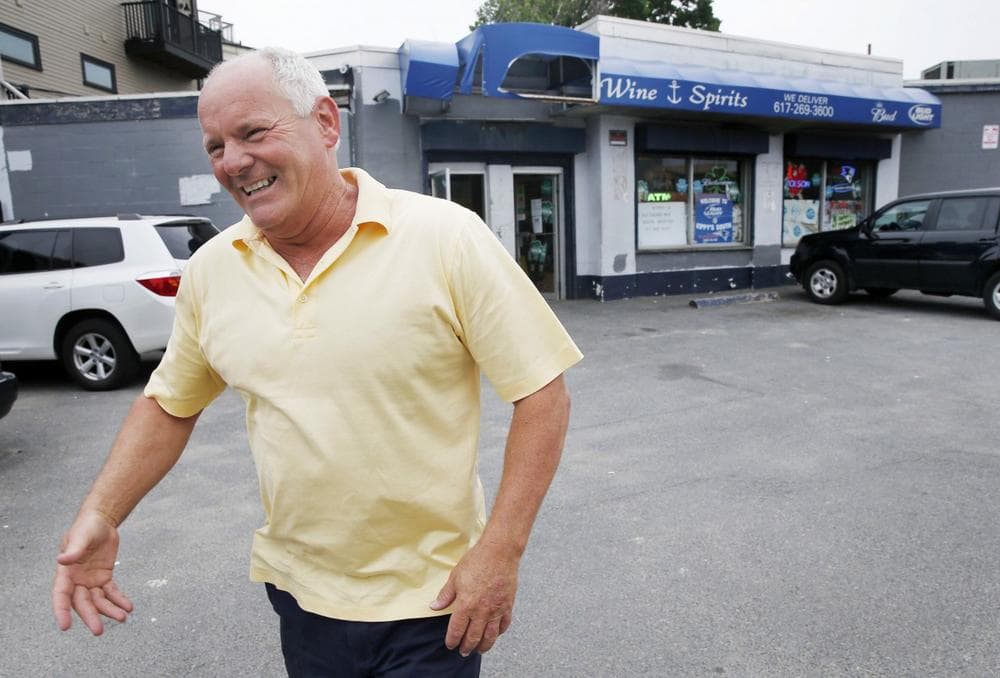 In this Thursday, June 6, 2013, file photo Stephen Rakes smiles after greeting an acquaintance outside the liquor store he once owned in the South Boston neighborhood of Boston. Authorities say Rakes, who was on the witness list for the racketeering trial of reputed mobster James &quot;Whitey&quot; Bulger, has died. The Middlesex District Attorney’s Office says Stephen Rakes was found dead Wednesday, July 17, 2013 about 1:30 p.m. in Lincoln, Mass., with no obvious signs of trauma to his body. (AP Photo/Michael Dwyer)