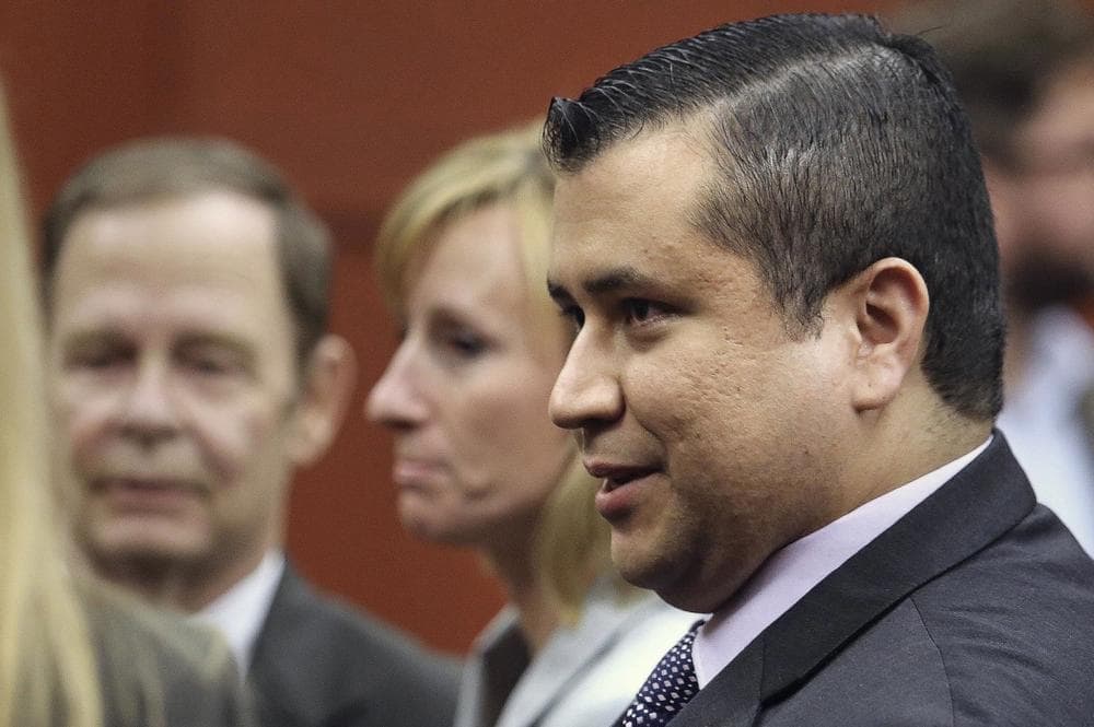 George Zimmerman leaves court with his family after Zimmerman's not guilty verdict was read in Seminole Circuit Court in Sanford, Fla. on Saturday, July 13, 2013. Jurors found Zimmerman not guilty of second-degree murder in the fatal shooting of 17-year-old Trayvon Martin in Sanford, Fla. (AP)