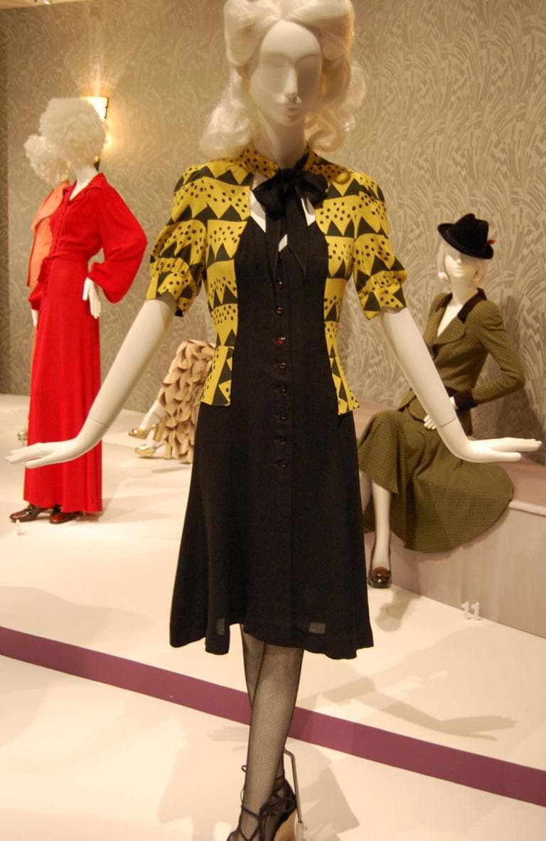 Ossie Clark helped revive the 1940s look with designs like this circa 1970 black button-down dress with a jacket (note the keyhole tie neckline) printed with an Art Deco pattern by Celia Birtwell. (Greg Cook)