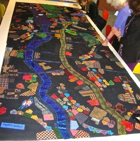 A yellow strip snaking down the middle of the quilt represents the marathon route. (Courtesy photo)