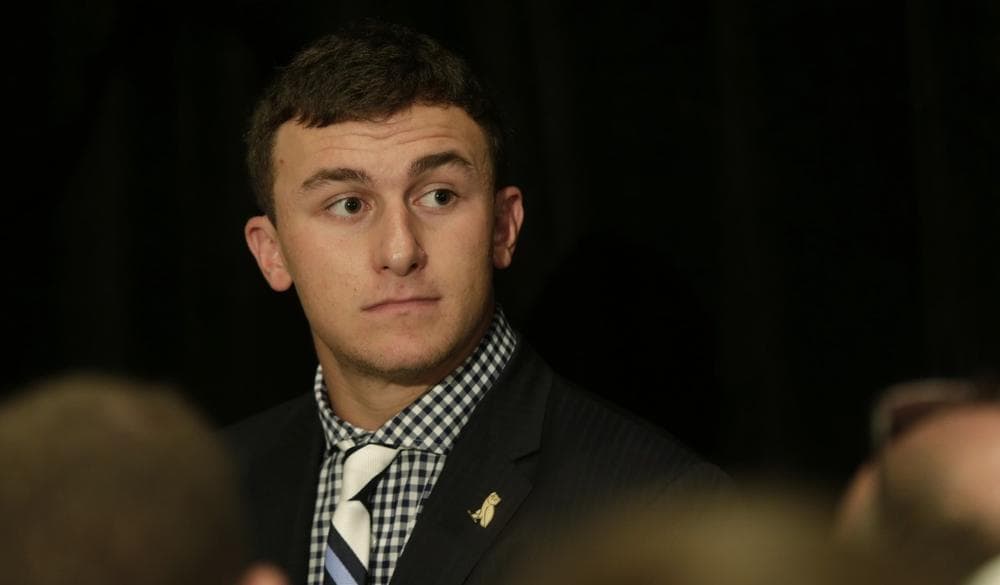 All the attention has worn on Johnny Manziel. (Dave Martin/AP)